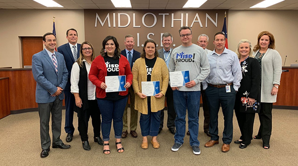 Walnut Grove Middle School Teachers, Alison Afshari (left, holding certificate), Jessica Lewis  and Eric Craddock recognized at Midlothian ISD Board of Trustees meeting